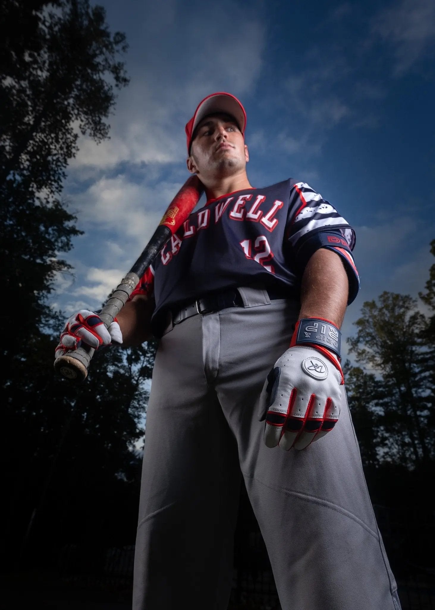 Closeup of long cuff with embroidered Drip & Rip logo on Flags batting gloves