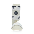Closeup of impact foam shell on Drip & Rip Batter's Leg Guard with embroidered logo